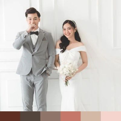 Bride and groom standing together color palette