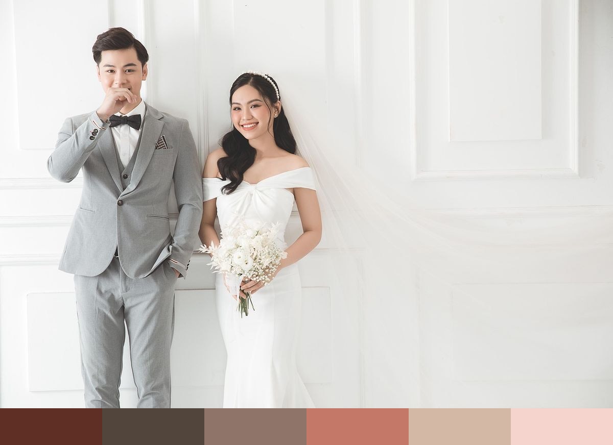 Bride and groom standing together color palette